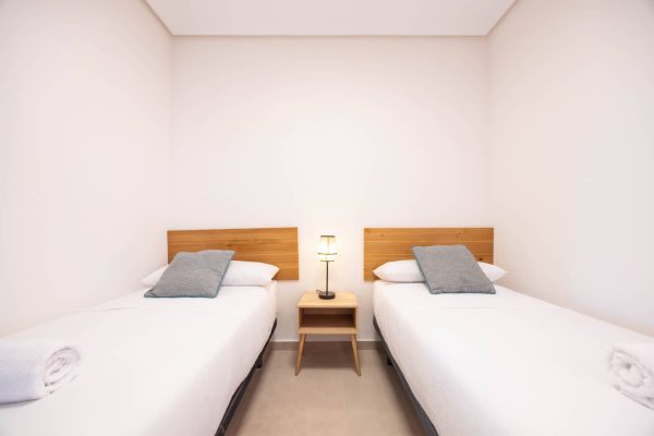 apartamento turistico los alcazares dormitorio camas individuales 2